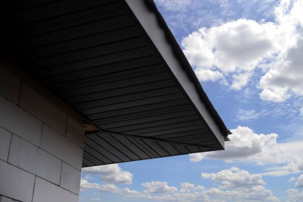 Roof overhang against blue sky